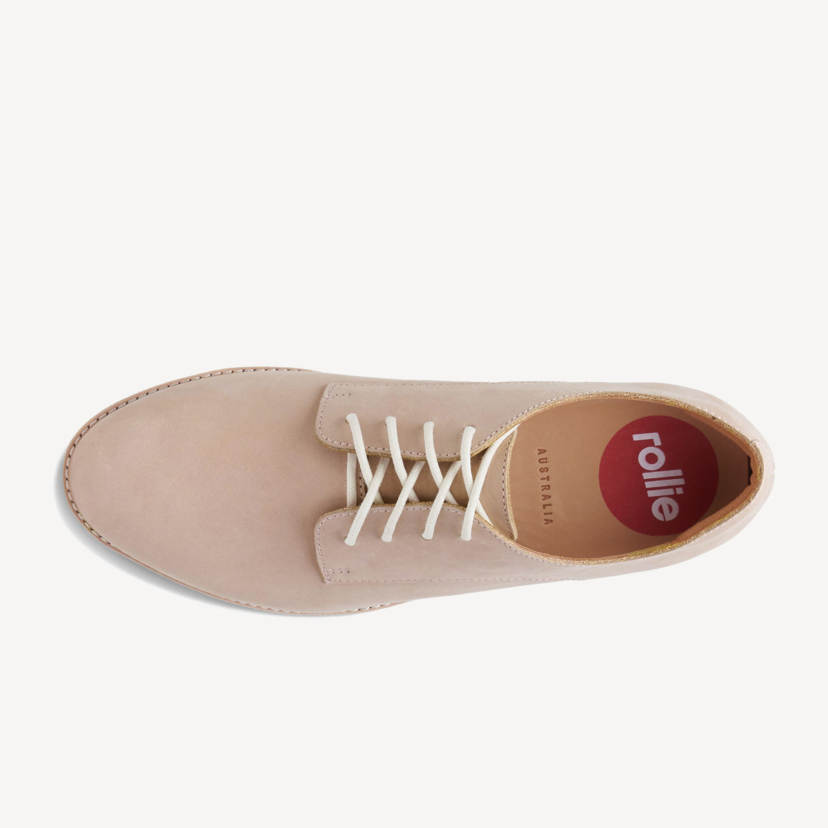 Rollie Derby Snow Pink — pastel-pink leather lace-up shoe, top-down view