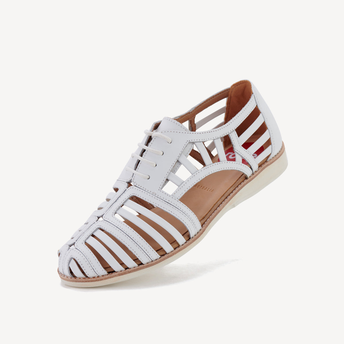 Rollie Sidecut Cage White — women's shoe, worn and styled on-foot