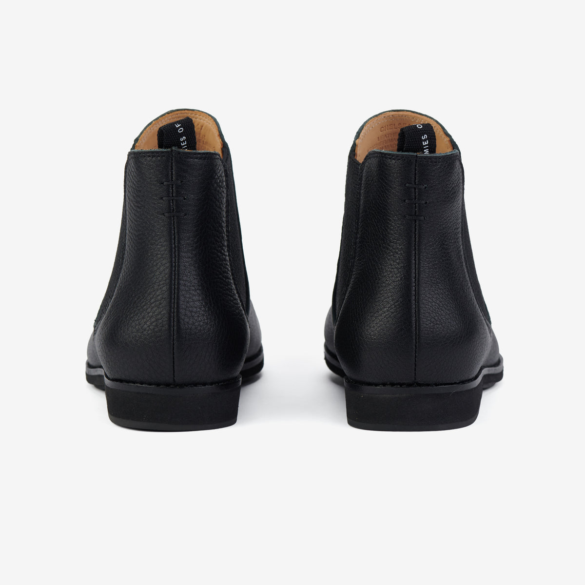 Rollie Chelsea All Black Tumble — all-black tumbled-leather Chelsea boot, heel and back view