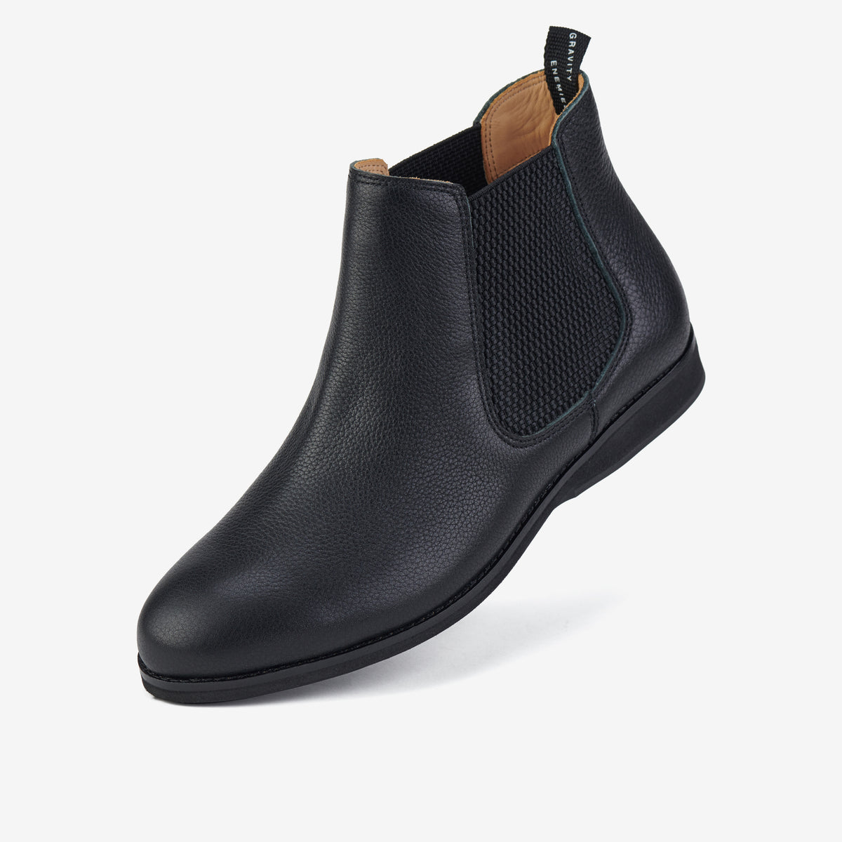 Rollie Chelsea All Black Tumble — all-black tumbled-leather Chelsea boot, styled lifestyle shot