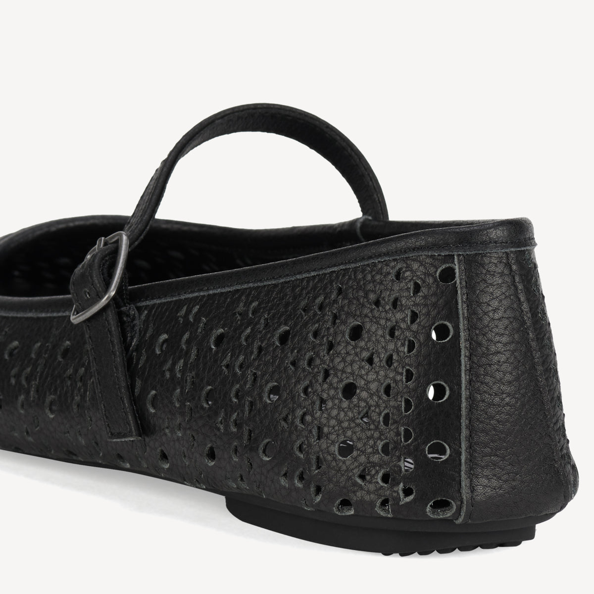 Rollie Ballet Mary Jane Laser Black — black laser-cut leather Mary Jane ballet flat, styled campaign shot (2)