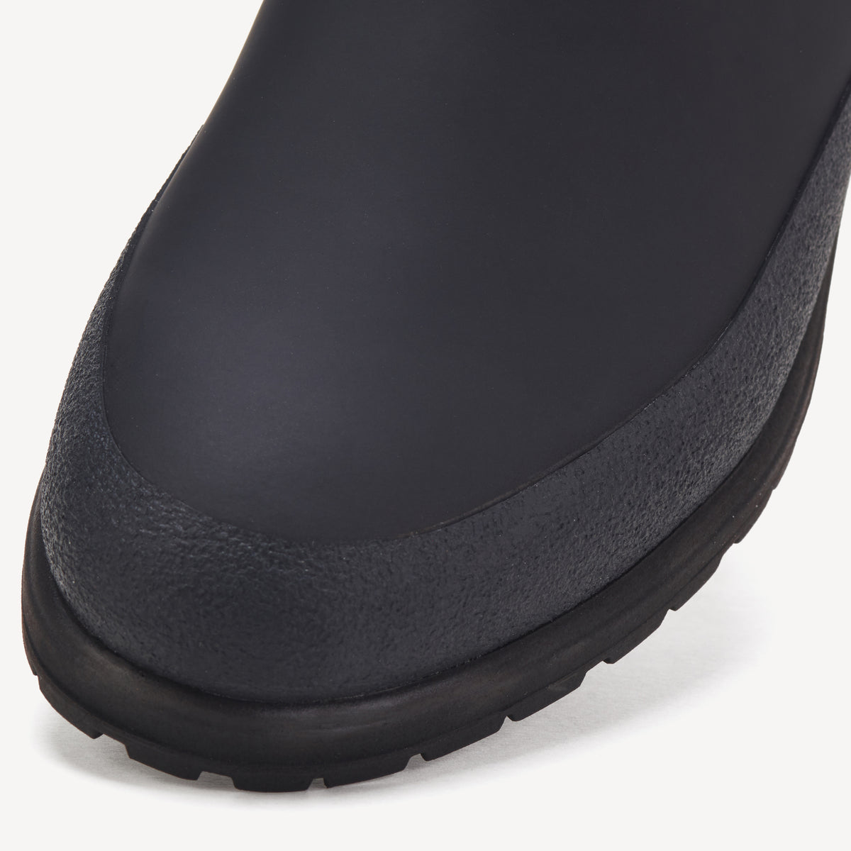 Rollie Fields Chelsea Rubberised Black — black rubberised Chelsea boot, styled campaign shot