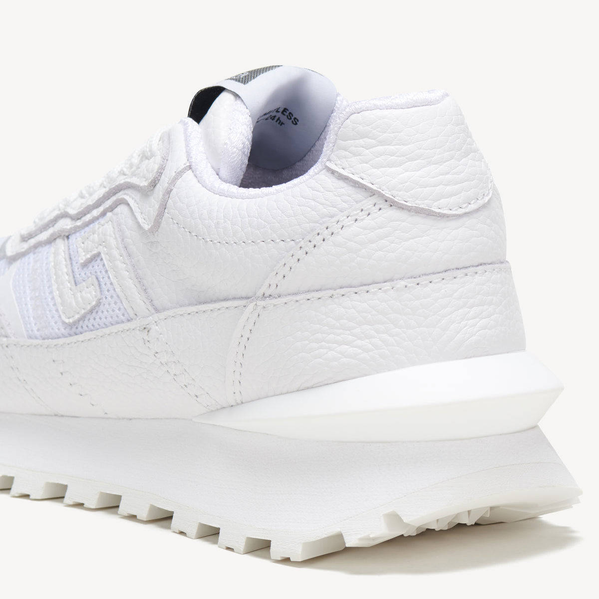 Rollie Kentu All White — women's sneaker, heel and back view