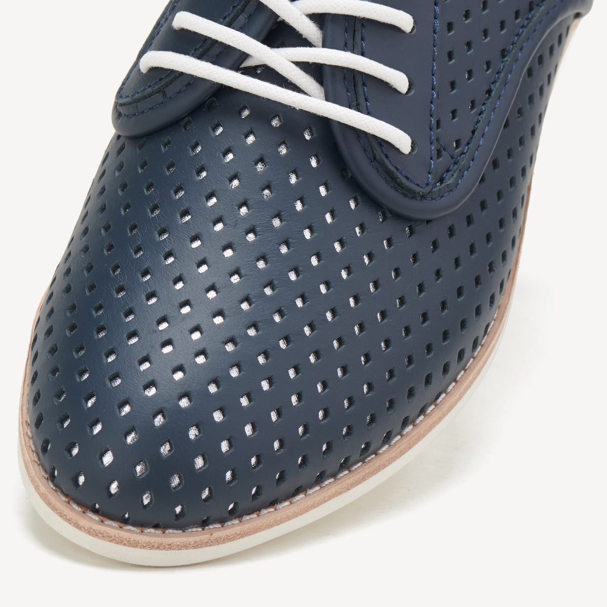 Rollie Derby Punch Overlay Dark Navy/Silver — women's shoe, angled three-quarter view