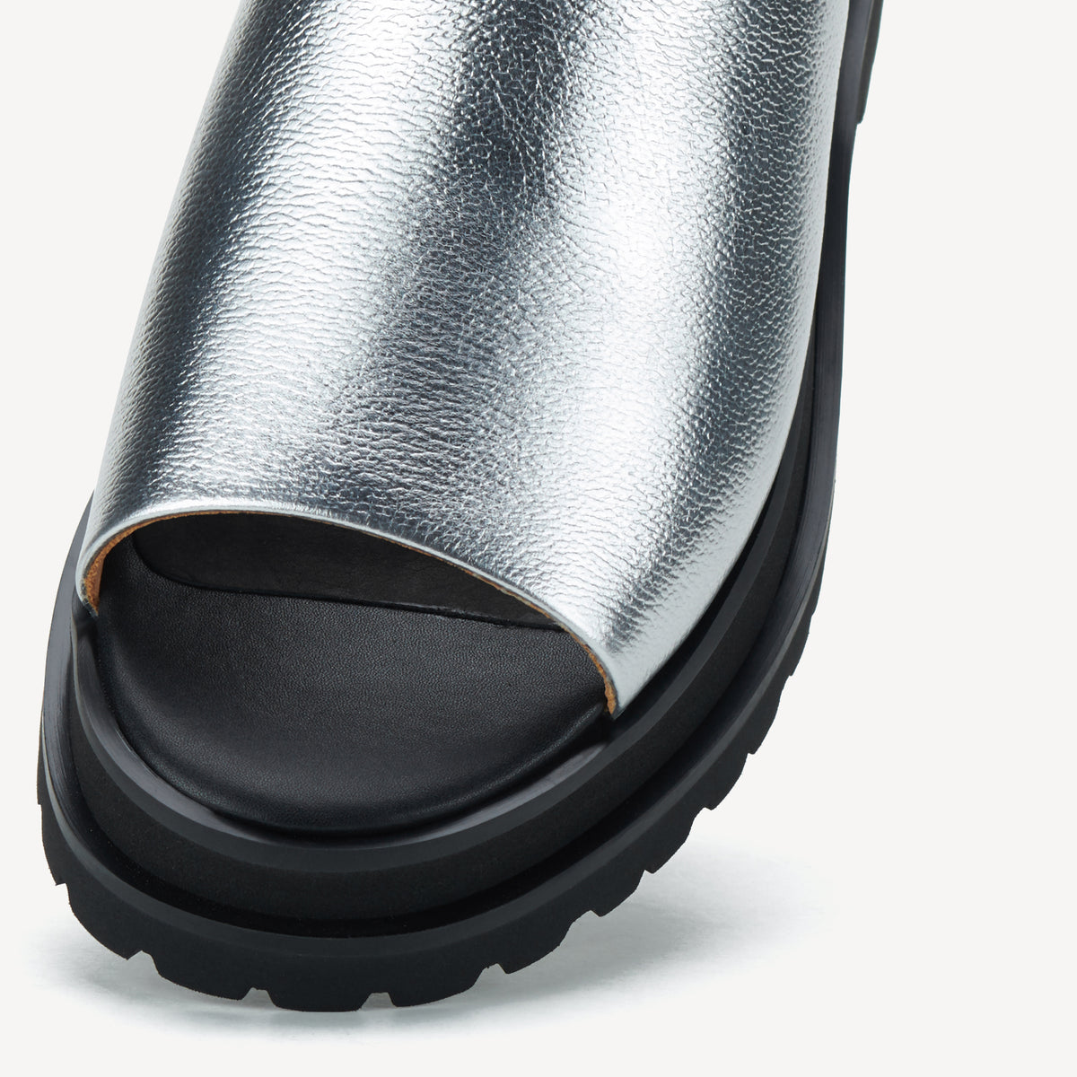 Rollie Slide Step Silver/Black — women's sandal, angled three-quarter view