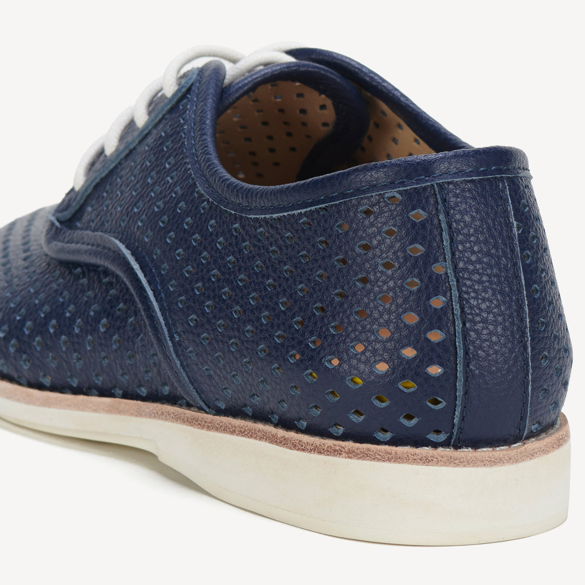 Rollie Derby Punch Navy Tumble — navy tumbled-leather punch-detail lace-up shoe, styled campaign shot (2)