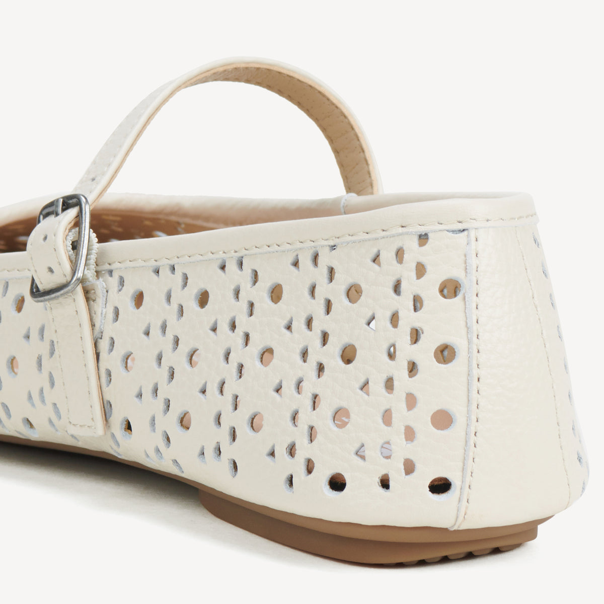 Rollie Ballet Mary Jane Laser Bone — bone laser-cut leather Mary Jane ballet flat, styled campaign shot (2)