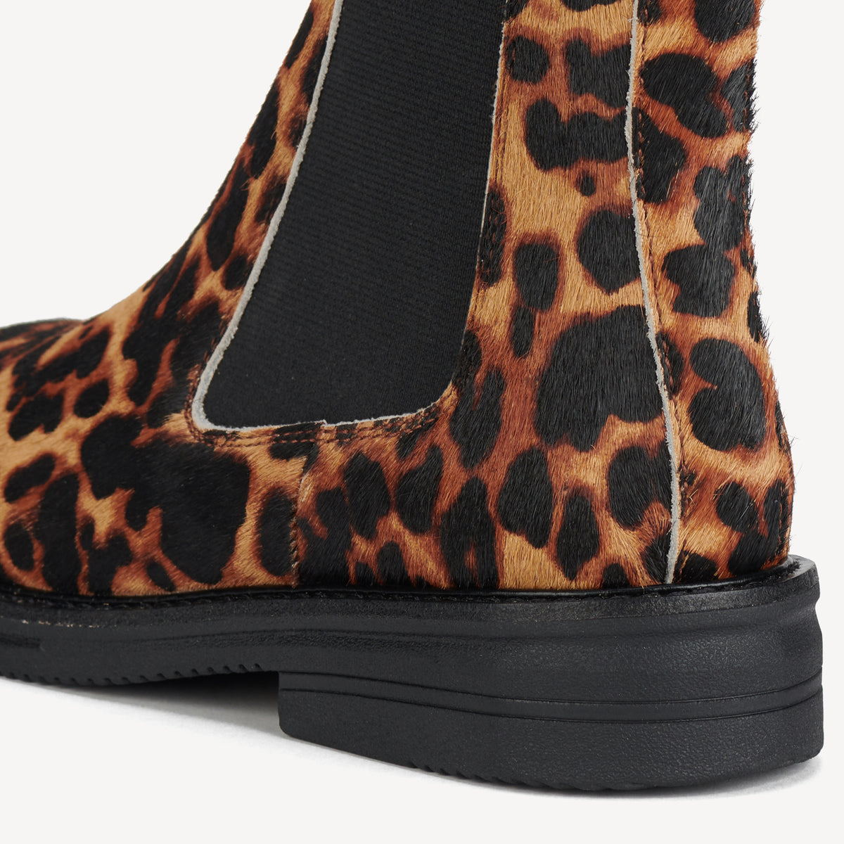Rollie Chelsea Rise Dark Camel Leopard — women's boot, heel and back view