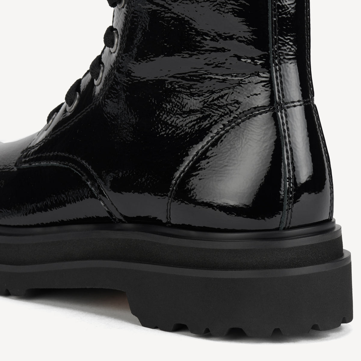 Rollie Pointed Sidezip Black Patent — women's boot, heel and back view