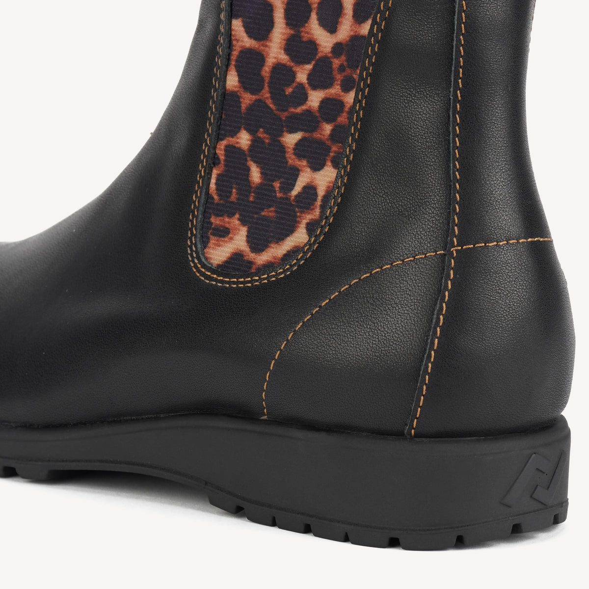 Rollie Fields Chelsea Black/Dark Camel Leopard — women's boot, heel and back view