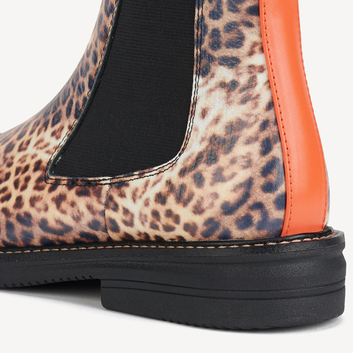 Rollie Rollie x Blunt Chelsea Rise WR Leopard — women's boot, heel and back view