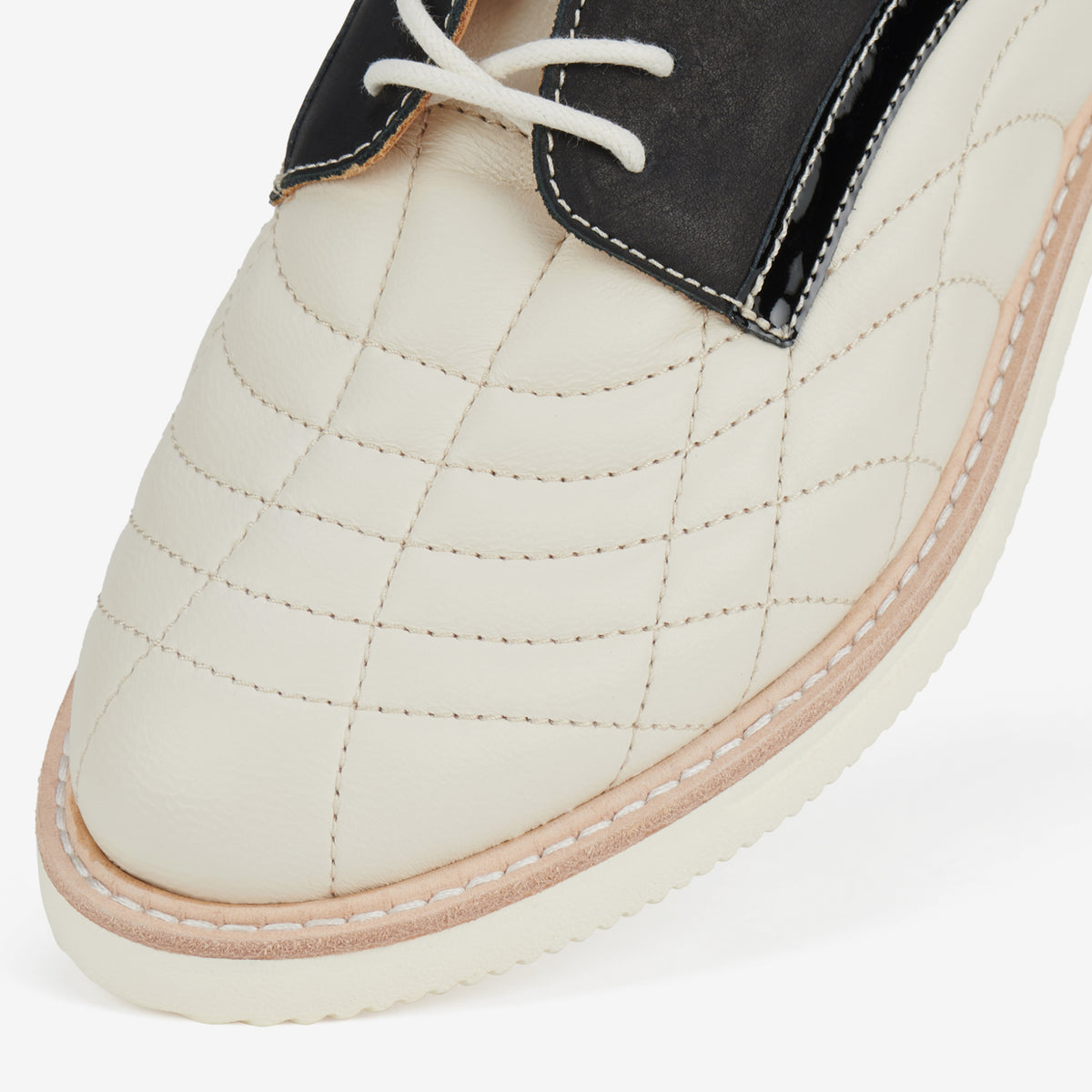 Rollie Derby Rise Monochrome Quilt — women's metallic leather lace-up shoe, styled campaign shot