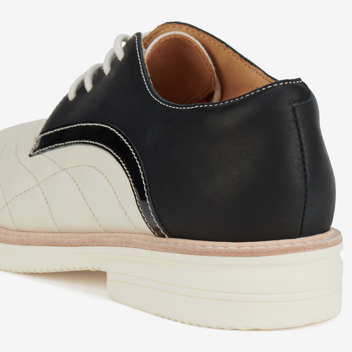 Rollie Derby Rise Monochrome Quilt — women's metallic leather lace-up shoe, styled campaign shot (2)