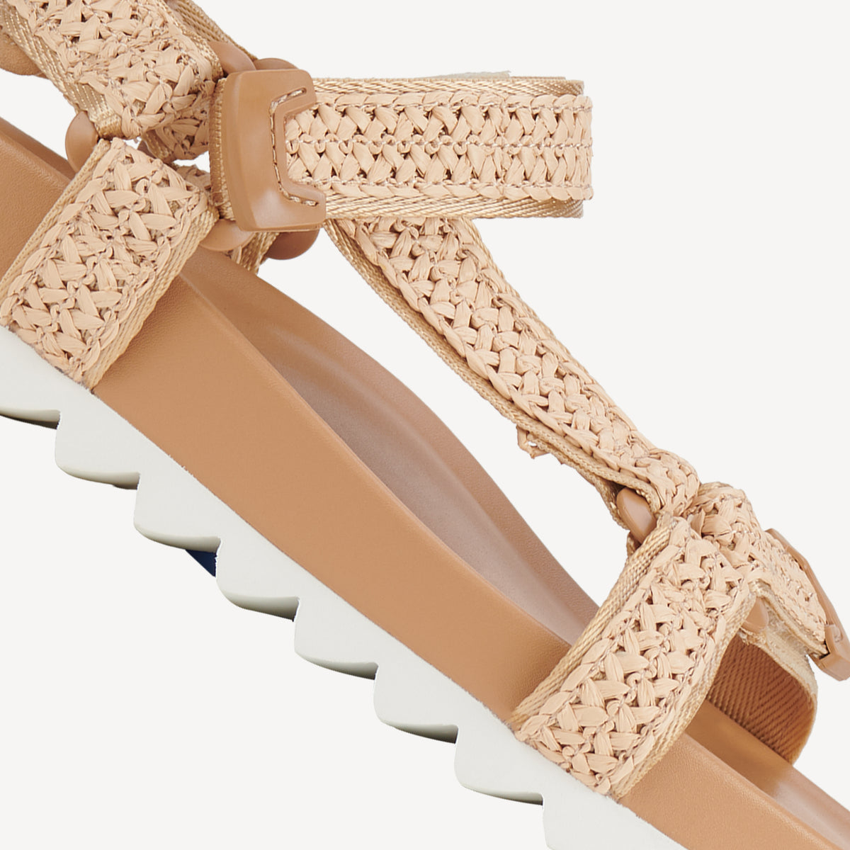 Rollie Sandal Tooth Wedge Natural Raffia — women's sandal, angled three-quarter view