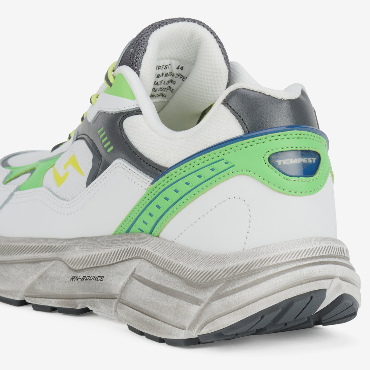 Rollie Tempest Citrus — women's leather sneaker, styled campaign shot (2)