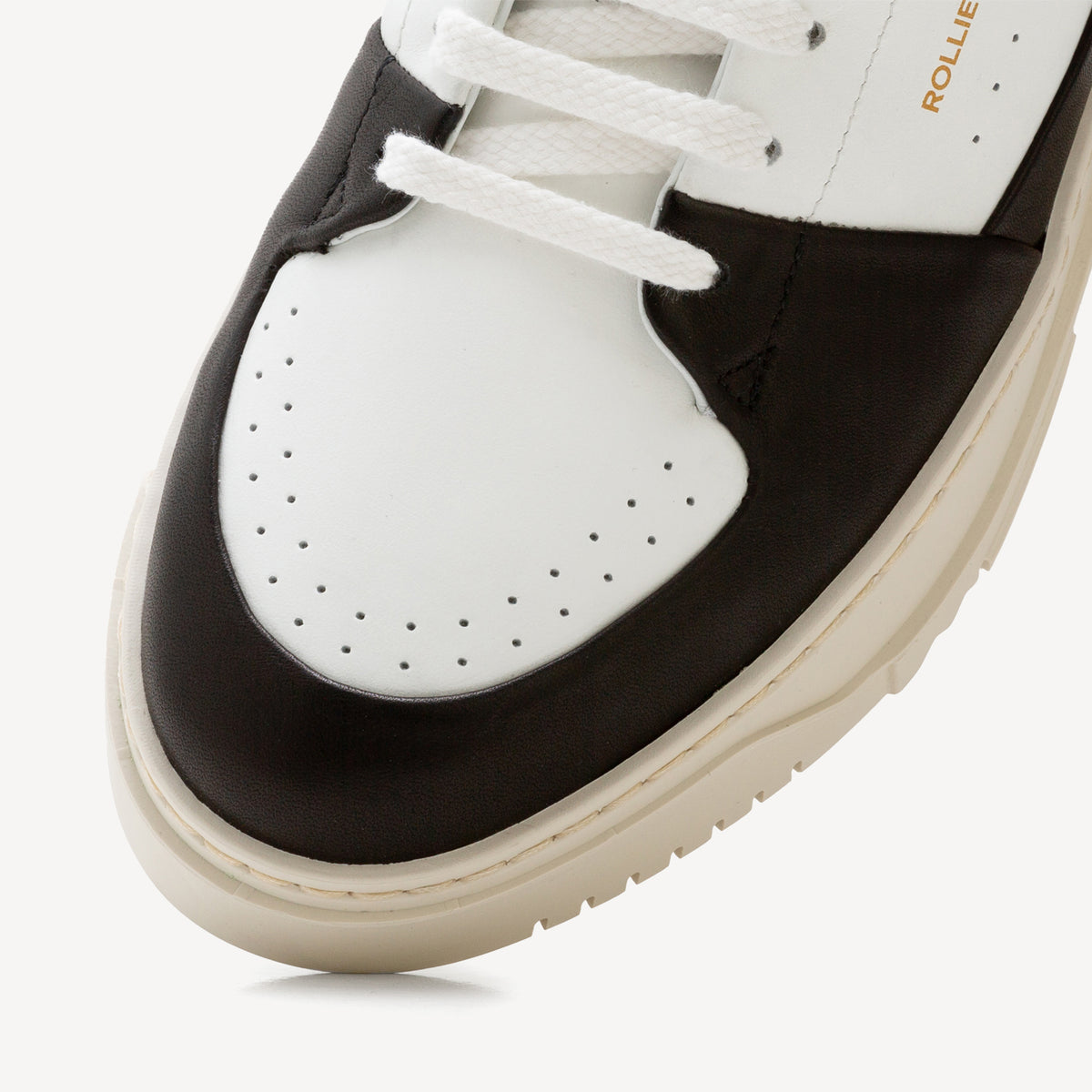 Rollie Wave Mens Black/White — men's sneaker, angled three-quarter view